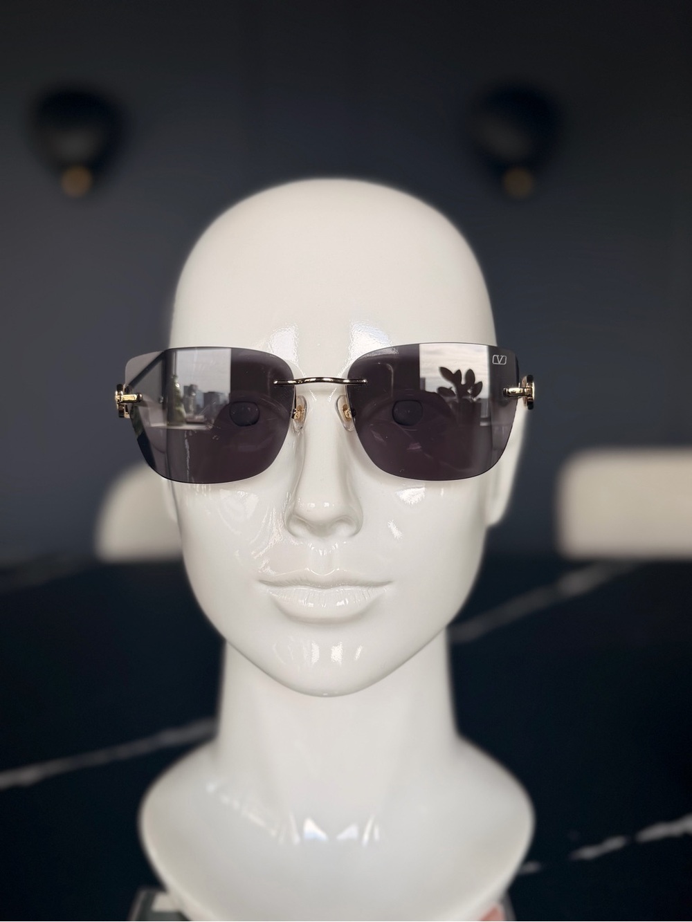 Gold-Trim Black Rimless Sunglasses - Designer Style